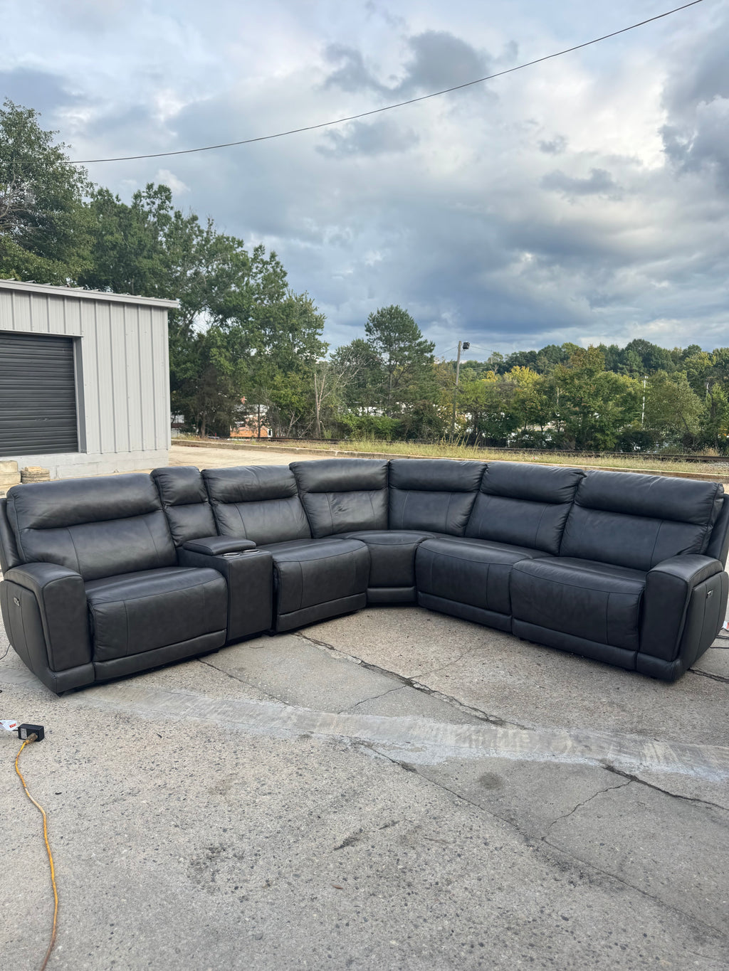 Power reclining sectional w/ storage armrest